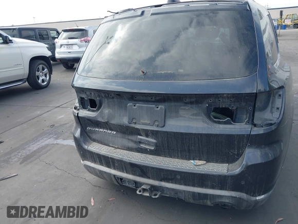 2015 Dodge Durango SXT with VIN 1C4RDHAG4FC113821, listed as a IAAI auction lot 42338999 with Not provided miles and . Bid and sale history available at DreamBid. Image 16.