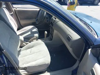1998 Toyota Corolla VE z VIN 2T1BR18E4WC099280, wystawiony jako IAAI lot #42624278 z przebiegiem 129 901 mil mil oraz . Historia ofert i sprzedaży dostępna na DreamBid. Obrazek 5.