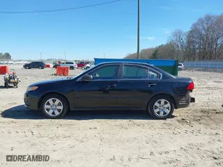 2009 Kia Optima LX with VIN KNAGE228895356661, listed as a IAAI auction lot 41821857 with 124,692 mi miles. Bid and sale history available at carsss.com. Image 15.