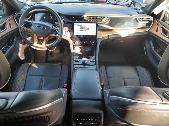 2023 Jeep Grand Cherokee Summit with VIN 1C4RJHEGXP8722063, listed as a Copart auction lot 86552894 with 38,463 mi miles and Salvage title. Bid and sale history available at DreamBid. Image 8.
