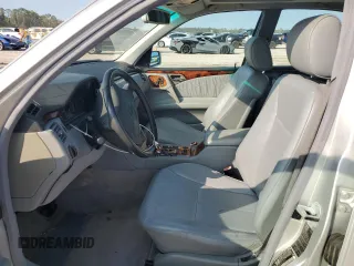 1999 Mercedes-Benz E-Class with VIN WDBJF65H9XA903481, listed as a Copart auction lot 79516914 with 201,080 mi miles and Salvage Title. Bid and sale history available at carsss.com. Image 7.