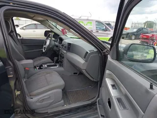 2005 Jeep Grand Cherokee Laredo with VIN 1J4GS48K65C570266, listed as a IAAI auction lot 42026624 with 162,512 mi miles. Bid and sale history available at carsss.com. Image 5.