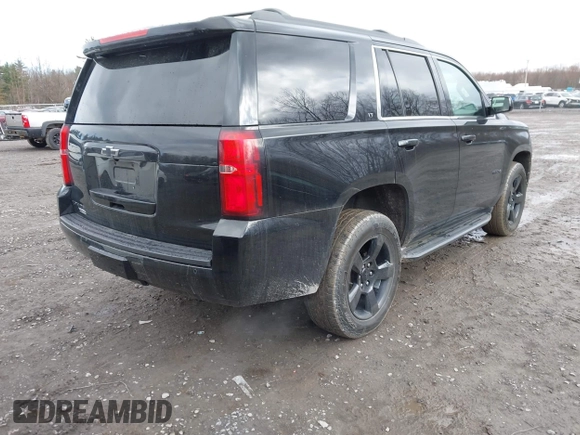 2018 Chevrolet Tahoe LT z VIN 1GNSKBKC7JR276427, wystawiony jako IAAI lot #41977418 z przebiegiem 152 007 mil mil oraz . Historia ofert i sprzedaży dostępna na DreamBid. Obrazek 4.