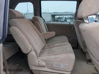 2001 Mazda MPV DX with VIN JM3LW28GX10193811, listed as a Copart auction lot 89283165 with 105,077 mi miles and Salvage Title. Bid and sale history available at carsss.com. Image 12.