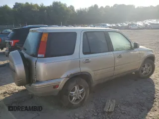 2000 Honda CR-V SE with VIN JHLRD1871YC038420, listed as a Copart auction lot 69101704 with 196,581 mi miles and Salvage Title. Bid and sale history available at carsss.com. Image 3.