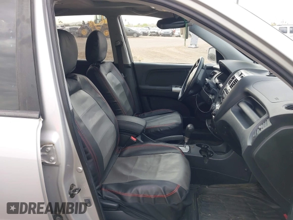 2005 Kia Sportage LX with VIN KNDJE723557070596, listed as a IAAI auction lot 42008414 with 215,204 mi miles and . Bid and sale history available at carsss.com. Image 5.