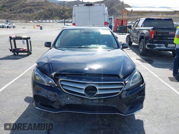 2014 Mercedes-Benz E 350 Sport with VIN WDDHF5KBXEA889555, listed as a IAAI auction lot 41589052 with 148,422 mi miles and . Bid and sale history available at DreamBid. Image 12.
