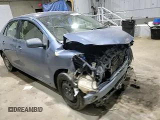 2009 Toyota Yaris with VIN JTDBT903094047243, listed as a Copart auction lot 47296455 with 235,483 mi miles and Salvage Title. Bid and sale history available at DreamBid. Image 10.