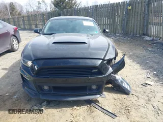 2016 Ford Mustang V6 with VIN 1FA6P8AMXG5222893, listed as a IAAI auction lot 41754837 with 52,892 mi miles and . Bid and sale history available at carsss.com. Image 12.