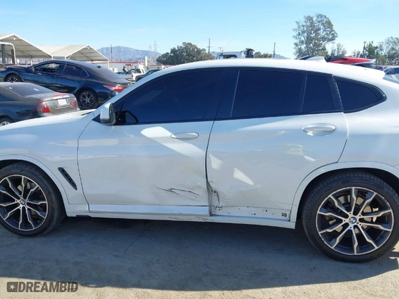 2021 BMW X4 xDrive30i with VIN 5UX2V1C0XM9E90574, listed as a IAAI auction lot 41422478 with NaN miles. Bid and sale history available at carsss.com. Image 14.