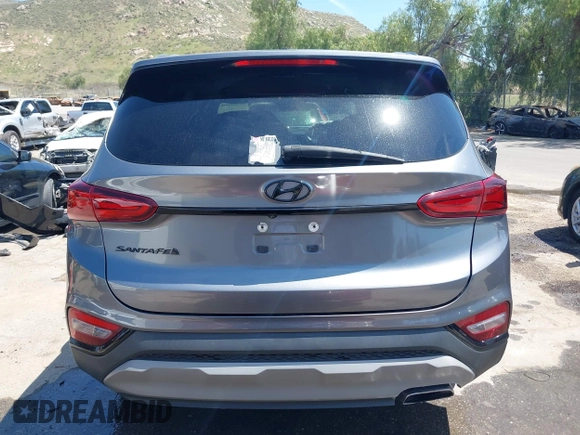2019 Hyundai Santa Fe SE with VIN 5NMS23AD7KH009688, listed as a IAAI auction lot 41991686 with 77,942 mi miles and . Bid and sale history available at DreamBid. Image 17.