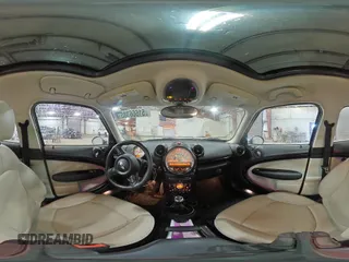 2013 MINI Countryman S ALL4 with VIN WMWZC5C5XDWM16477, listed as a Copart auction lot 51666385 with 112,383 mi miles and Salvage title. Bid and sale history available at DreamBid. Image 12.