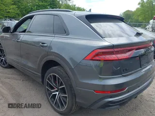 2021 Audi Q8 Premium Plus with VIN WA1EVAF14MD036327, listed as a IAAI auction lot 42237144 with 59,157 mi miles and . Bid and sale history available at DreamBid. Image 3.
