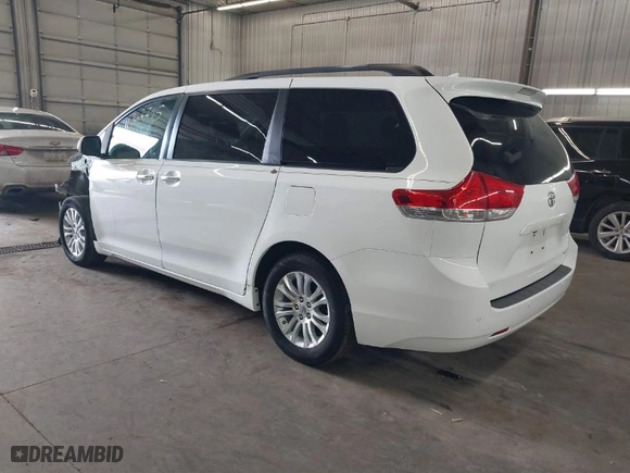 2012 Toyota Sienna XLE AAS with VIN 5TDYK3DC2CS196897, listed as a IAAI auction lot 41762345 with 183,188 mi miles. Bid and sale history available at carsss.com. Image 3.