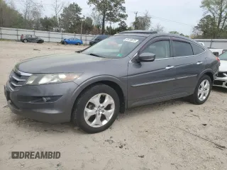 2012 Honda Crosstour EX-L z VIN 5J6TF1H53CL002260, wystawiony jako Copart lot #51819075 z przebiegiem 140 032 mil mil oraz Czysty tytuł • Clean title. Historia ofert i sprzedaży dostępna na DreamBid. Obrazek 1.