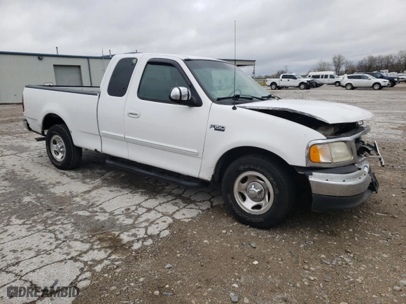 1999 Ford F-150 Work Series with VIN 1FTZX1727XKB60214, listed as a Copart auction lot 80612004 with 255,303 mi miles and Salvage Title. Bid and sale history available at carsss.com. Image 4.