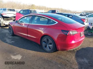 2018 Tesla Model 3 Long Range Battery with VIN 5YJ3E1EB4JF065581, listed as a IAAI auction lot 41542190 with 4,154 mi miles and . Bid and sale history available at DreamBid. Image 3.