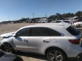 2018 Acura MDX w/Technology Pkg with VIN 5J8YD4H57JL016650, listed as a IAAI auction lot 40979704 with 82,980 mi miles. Bid and sale history available at carsss.com. Image 14.