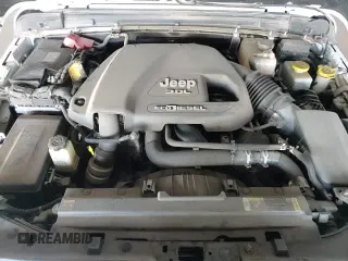 2021 Jeep Wrangler Unlimited Sahara Altitude с VIN 1C4HJXEM2MW596316, выставлен на аукционе Copart как лот 66733665 с пробегом 29 795 миль миль и Списание • Salvage title. История ставок и продаж доступна на DreamBid. Изображение 14.