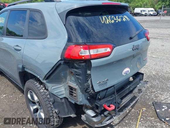 2014 Jeep Cherokee Trailhawk z VIN 1C4PJMBS4EW236950, wystawiony jako IAAI lot #42636128 z przebiegiem 170 491 mil mil oraz . Historia ofert i sprzedaży dostępna na DreamBid. Obrazek 6.