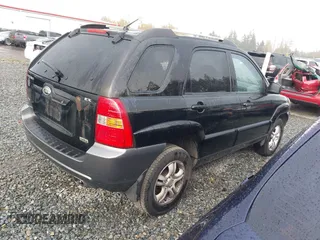 2005 Kia Sportage LX with VIN KNDJF723557054234, listed as a IAAI auction lot 40652851 with 220,215 mi miles and . Bid and sale history available at carsss.com. Image 4.
