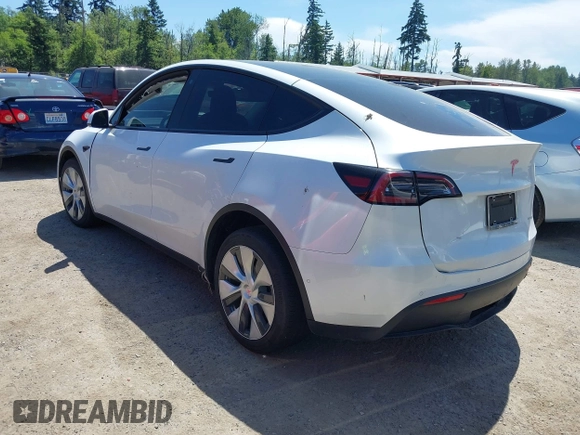 2022 Tesla Model Y Long Range z VIN 7SAYGDEE9NF509655, wystawiony jako IAAI lot #42433796 z przebiegiem 46 936 mil mil oraz . Historia ofert i sprzedaży dostępna na DreamBid. Obrazek 3.