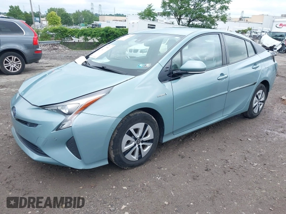 2017 Toyota Prius Two with VIN JTDKARFU2H3048467, listed as a IAAI auction lot 42509950 with 69,322 mi miles and . Bid and sale history available at DreamBid. Image 2.