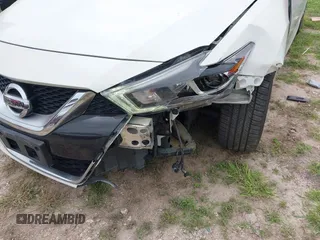 2017 Nissan Maxima Platinum with VIN 1N4AA6AP9HC408433, listed as a IAAI auction lot 41924547 with 47,214 mi miles and . Bid and sale history available at DreamBid. Image 6.