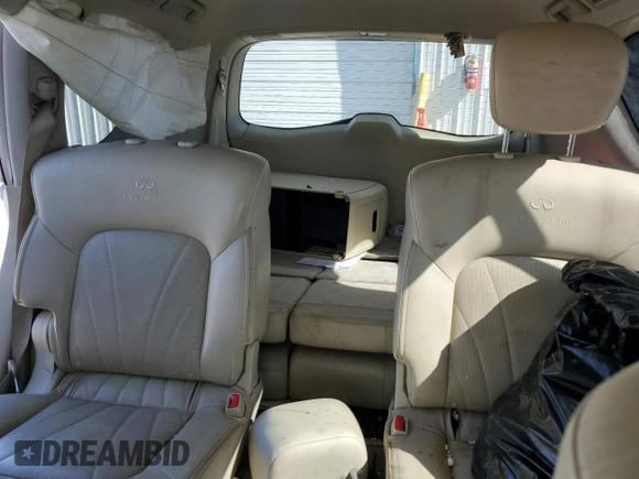2012 Infiniti QX56 7-passenger with VIN JN8AZ2NE1C9017744, listed as a Copart auction lot 52988725 with 142,820 mi miles and Salvage title. Bid and sale history available at DreamBid. Image 10.