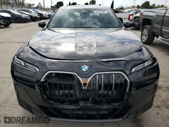 2024 BMW 7 Series 740i with VIN WBA23EH03RCP67206, listed as a Copart auction lot 54631285 with 22,901 mi miles and Salvage title. Bid and sale history available at DreamBid. Image 5.
