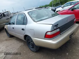 1997 Toyota Corolla with VIN 1NXBA02E7VZ544005, listed as a IAAI auction lot 42363262 with 200,537 mi miles and . Bid and sale history available at DreamBid. Image 3.