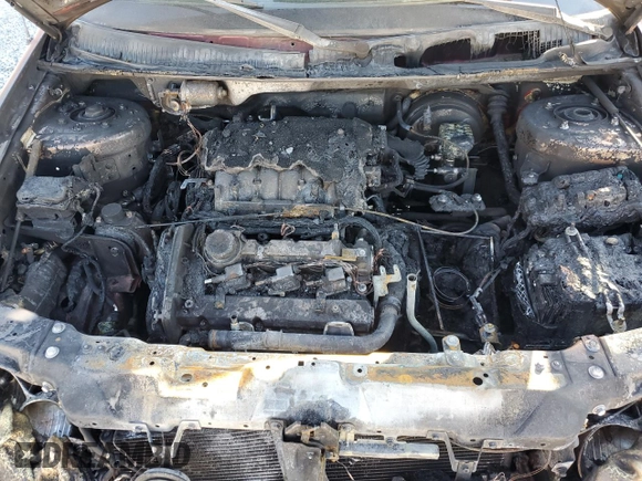2005 Kia Sedona LX with VIN KNDUP132056683645, listed as a Copart auction lot 86584104 with 0 mi miles and Salvage Title. Bid and sale history available at carsss.com. Image 12.