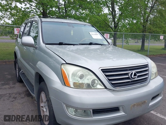 2004 Lexus GX 470 with VIN JTJBT20XX40032417, listed as a IAAI auction lot 42150885 with 180,568 mi miles. Bid and sale history available at carsss.com. Image 1.
