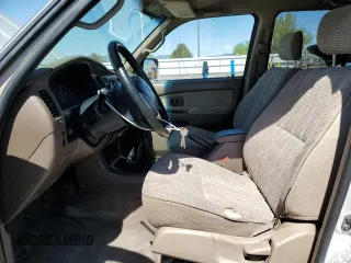 1997 Toyota 4Runner SR5 z VIN JT3HN86RXV0057844, wystawiony jako Copart lot #55357775 z przebiegiem 308 521 mil mil oraz Szkoda całkowita • Salvage title. Historia ofert i sprzedaży dostępna na DreamBid. Obrazek 7.