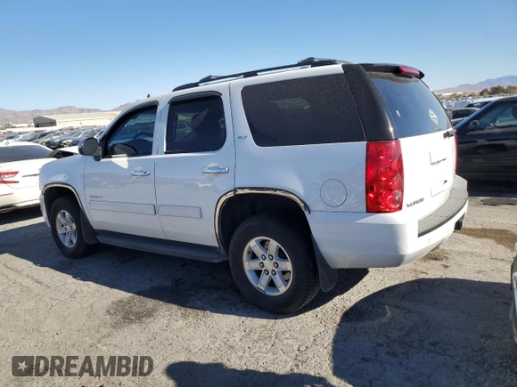 2014 GMC Yukon SLT with VIN 1GKS2CE05ER200523, listed as a Copart auction lot 80029144 with 183,669 mi miles and Salvage Title. Bid and sale history available at DreamBid. Image 2.
