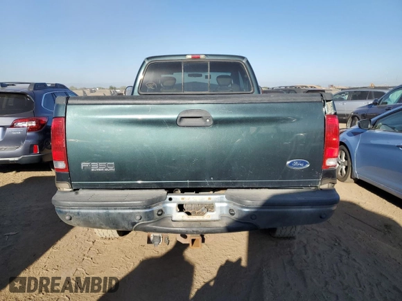 2004 Ford F-350 XL with VIN 1FTSX31S74EA99706, listed as a Copart auction lot 74728144 with Not Provided miles and Salvage Title. Bid and sale history available at DreamBid. Image 6.