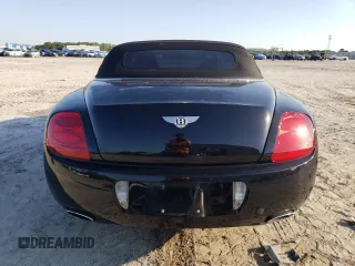 2007 Bentley Continental GT z VIN SCBDR33W97C043904, wystawiony jako Copart lot #52854405 z przebiegiem 54 335 mil mil oraz Szkody całkowita. Historia ofert i sprzedaży dostępna na DreamBid. Obrazek 6.