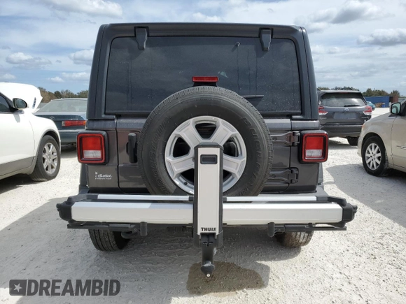 2021 Jeep Wrangler Sport with VIN 1C4GJXAN9MW552436, listed as a Copart auction lot 77204374 with Not Provided miles and Non Repairable. Bid and sale history available at DreamBid. Image 6.