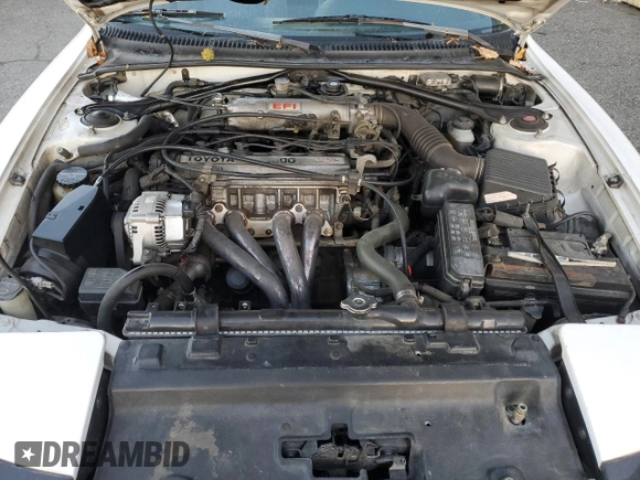 1990 Toyota Celica z VIN JT2ST87NXL0013674, wystawiony jako Copart lot #79434724 z przebiegiem 219 997 mil mil oraz Szkoda całkowita • Salvage title. Historia ofert i sprzedaży dostępna na DreamBid. Obrazek 11.