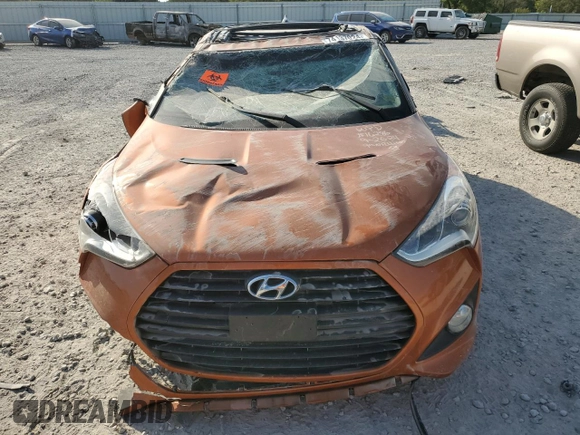 2015 Hyundai Veloster Turbo z VIN KMHTC6AE4FU232597, wystawiony jako Copart lot #74137024 z przebiegiem Nie podano mil oraz Szkoda całkowita • Salvage title. Historia ofert i sprzedaży dostępna na DreamBid. Obrazek 5.