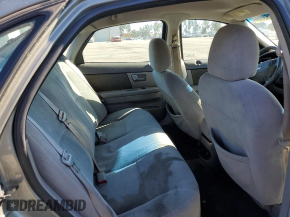 2001 Ford Taurus LX Standard z VIN 1FAFP52U51A138332, wystawiony jako Copart lot #88528355 z przebiegiem 166 511 mil mil oraz Szkoda całkowita • Salvage title. Historia ofert i sprzedaży dostępna na DreamBid. Obrazek 10.