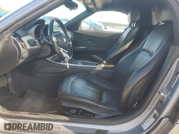 2006 BMW Z4 3.0si with VIN 4USBU53566LX00267, listed as a Copart auction lot 55820915 with 143,288 mi miles and Salvage title. Bid and sale history available at DreamBid. Image 7.