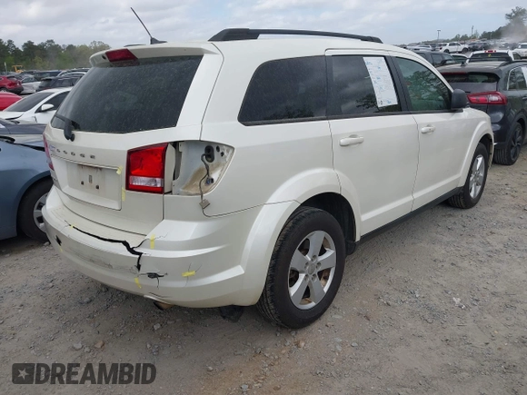 2014 Dodge Journey SE with VIN 3C4PDCABXET135338, listed as a IAAI auction lot 41950088 with 209,944 mi miles. Bid and sale history available at carsss.com. Image 4.