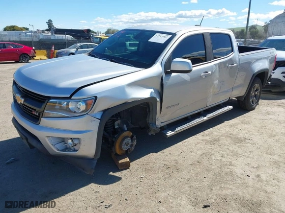 2019 Chevrolet Colorado 4WD Z71 with VIN 1GCGTDEN2K1146043, listed as a IAAI auction lot 41712002 with 84,034 mi miles. Bid and sale history available at carsss.com. Image 2.