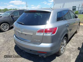 2009 Mazda CX-9 Touring z VIN JM3TB28A990179949, wystawiony jako IAAI lot #42353442 z przebiegiem 257 378 mil mil oraz . Historia ofert i sprzedaży dostępna na DreamBid. Obrazek 4.