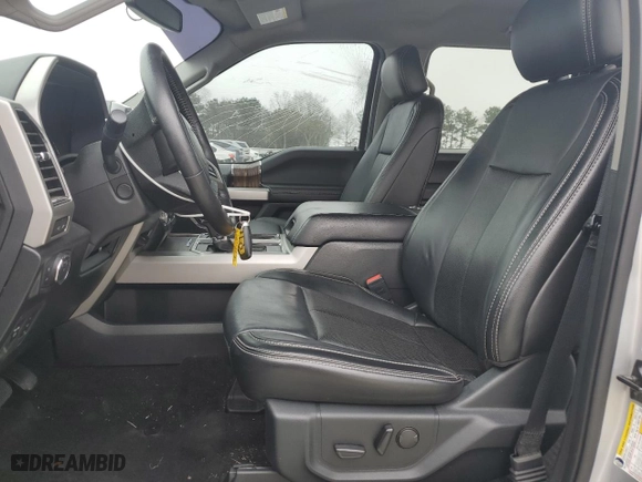 2019 Ford F-150 XL with VIN 1FTEW1E55KFC63986, listed as a Copart auction lot 48710285 with 63,902 mi miles and Salvage Title. Bid and sale history available at carsss.com. Image 7.