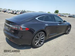 2016 Tesla Model S 90D z VIN 5YJSA1E29GF158774, wystawiony jako Copart lot #60143405 z przebiegiem Nie podano mil oraz Szkoda całkowita • Salvage title. Historia ofert i sprzedaży dostępna na DreamBid. Obrazek 3.