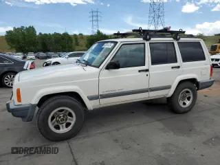 2000 Jeep Cherokee with VIN 1J4FF48S4YL256006, listed as a Copart auction lot 63091475 with 144,856 mi miles and Clean title. Bid and sale history available at DreamBid. Image 1.
