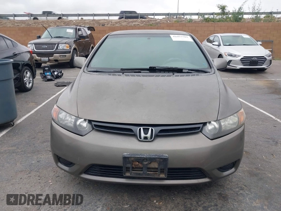 2006 Honda Civic Cpe LX with VIN 2HGFG126X6H543617, listed as a IAAI auction lot 42067509 with 273,341 mi miles. Bid and sale history available at carsss.com. Image 12.