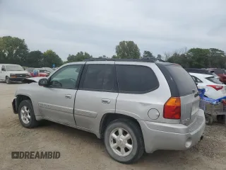 2005 GMC Envoy SLT with VIN 1GKDT13S852330514, listed as a Copart auction lot 71190504 with 203,616 mi miles and Salvage Title. Bid and sale history available at carsss.com. Image 2.